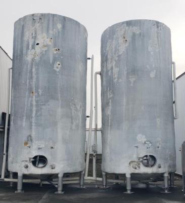 Two 9000 gallon, insulated closed top wine tanks.